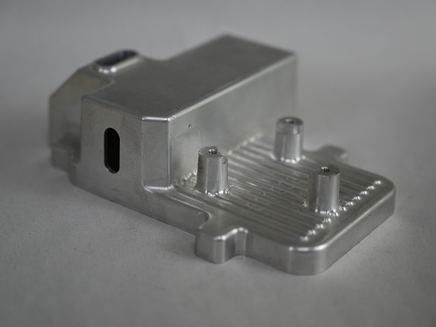 Small CNC machined metal product from front
